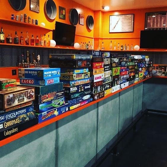 The board game library behind the bar at Saturn